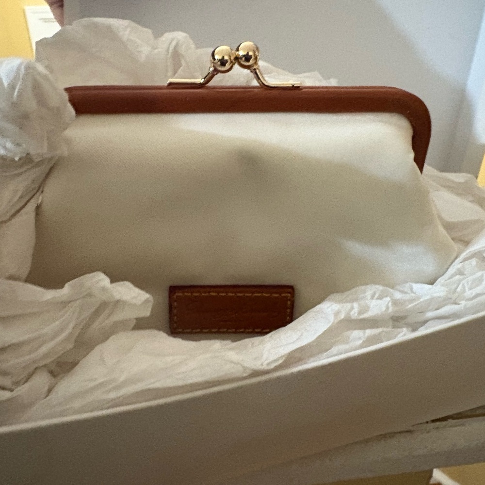 Dooney & Bourke White and Tan Clutch